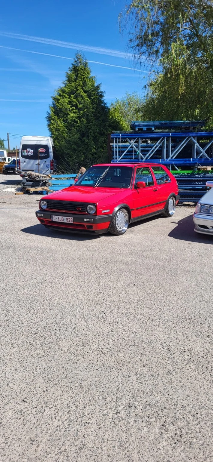 Volkswagen Golf rouge vue de trois quarts avant — démonstration Cartec du 25 avril 2026