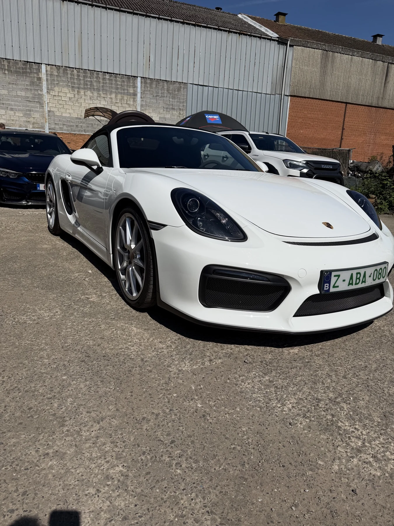 Porsche blanche photographiée de trois quarts — démonstration gratuite Cartec du 25 avril 2026, Sébastien Cartec Wallonie